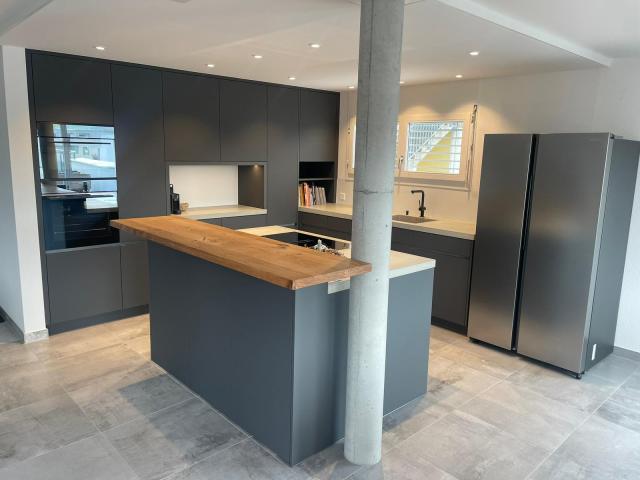 Küche mit Betonabdeckung